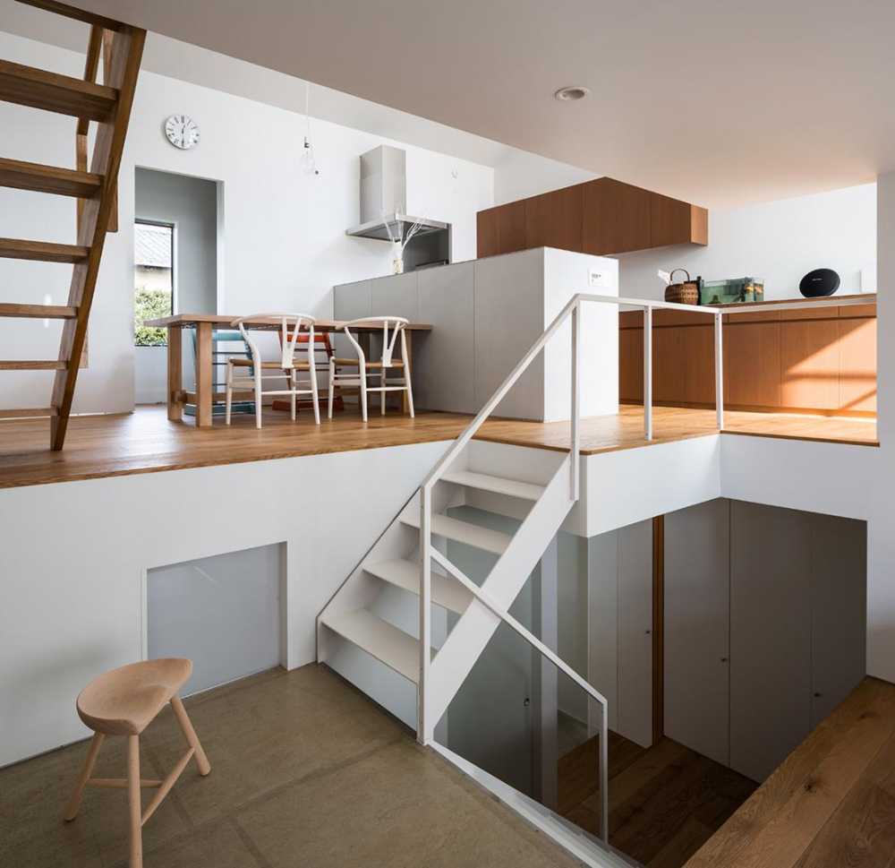 Cantilevered wooden house with horizontal slats