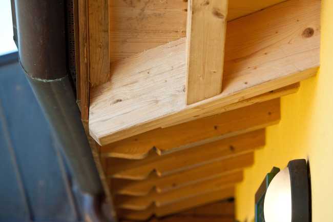 Tetto in legno con travi a vista