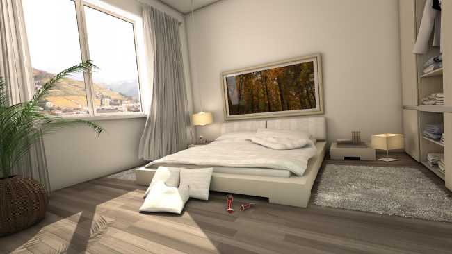 Camera da letto di un condominio costruito in legno