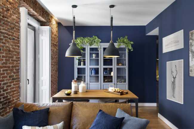 Brick apartment with parquet and blue walls