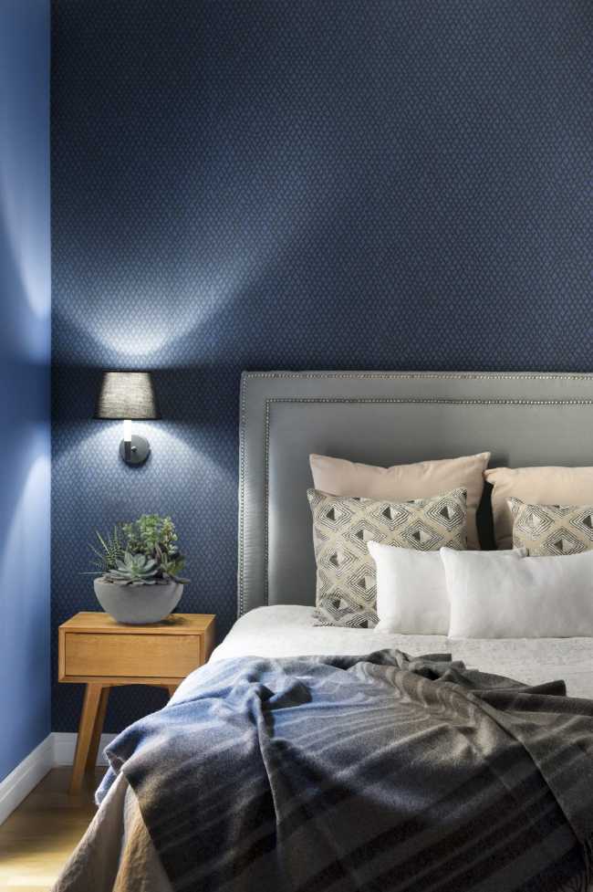 Bedroom with blue wall