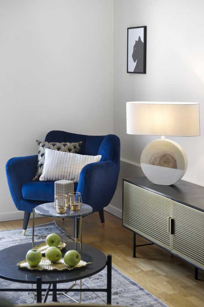 Living room with blue armchair