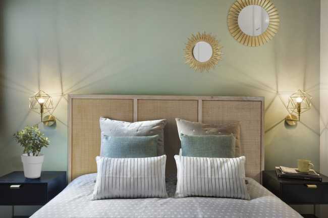 Bedroom with light green wall