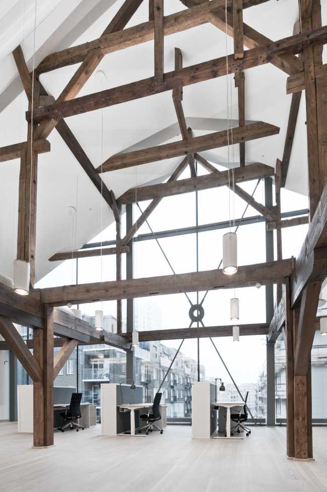 Exposed wooden structure for the interior of a company