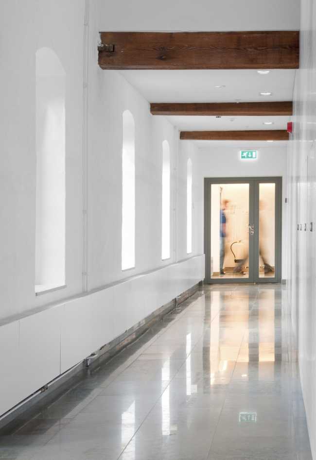Corridor of a blank company with reflective floor