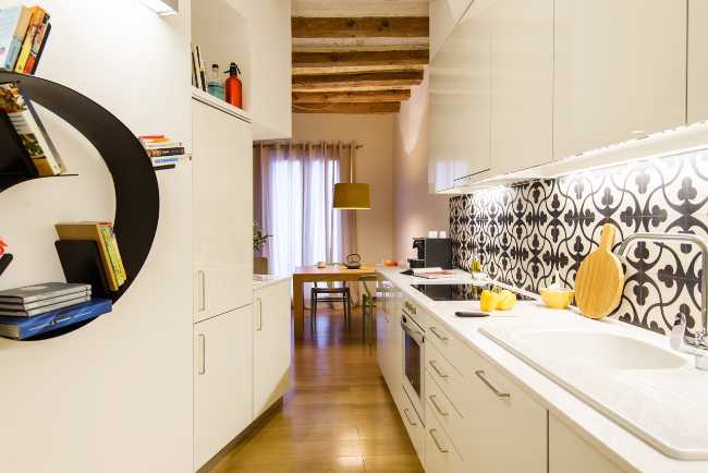 White kitchen and black and white tiles