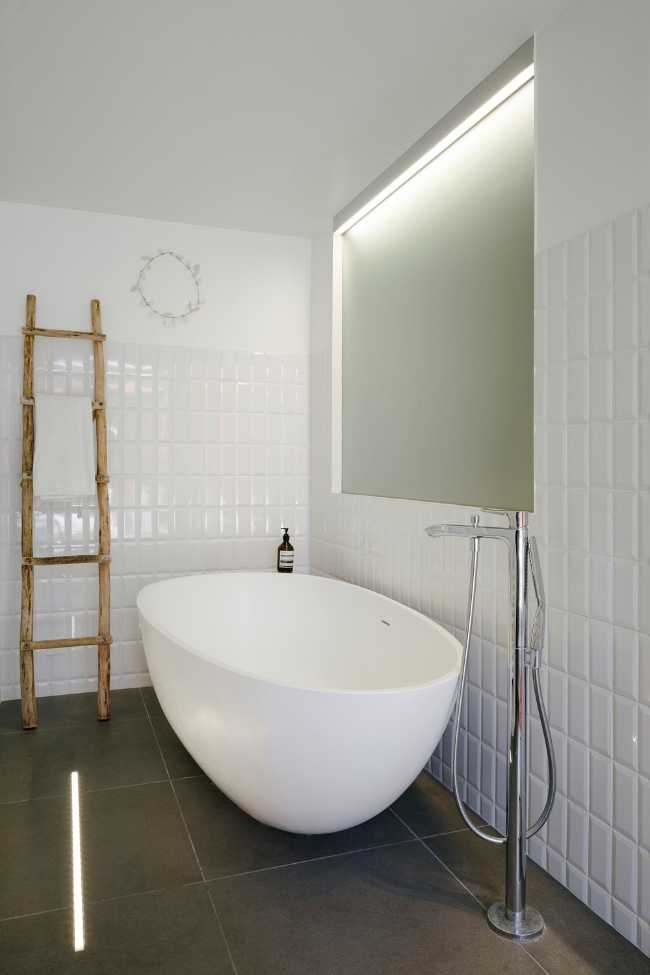 Bathroom with oval tub