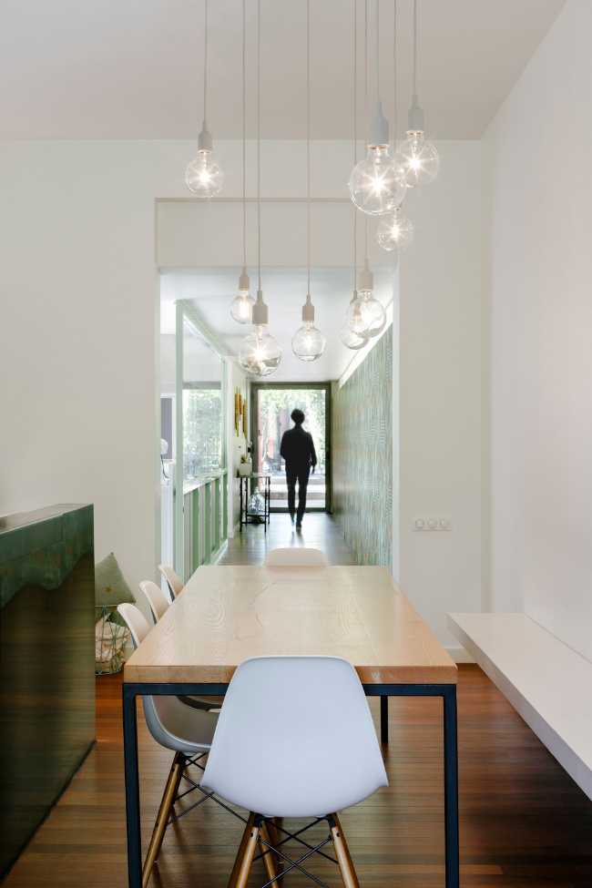 Dining table aligned with the corridor
