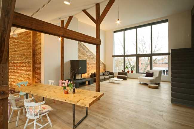 Hormigón, madera y yeso para un loft reformado