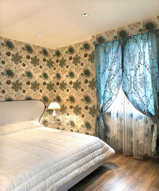 Bedroom with drawings on the wall