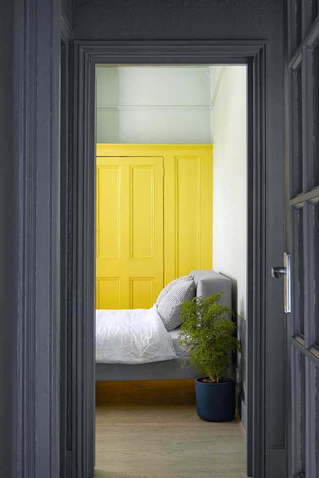 bedroom and yellow wardrobe