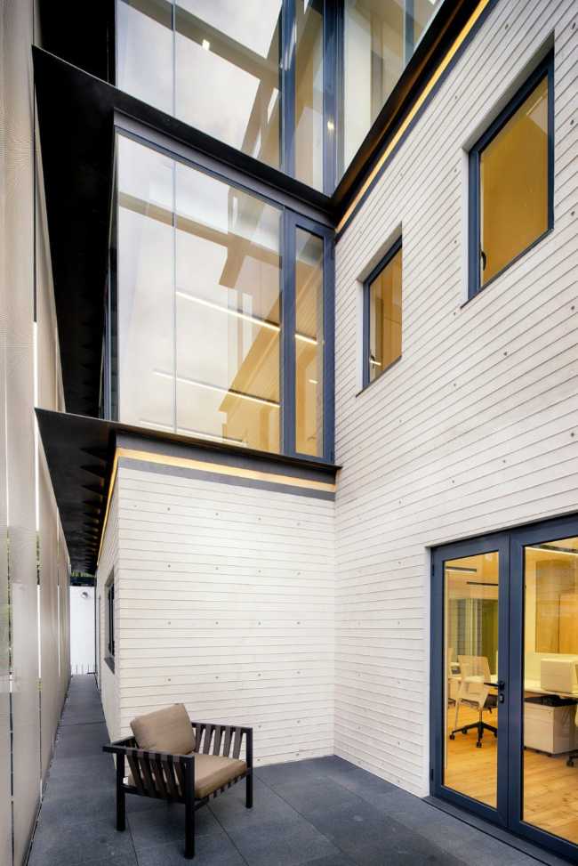 Wooden inner court and glass openings