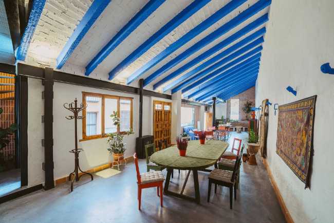Inside agricultural building recovered with blue and white roof