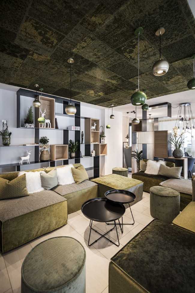 relaxation area with sofas and poufs