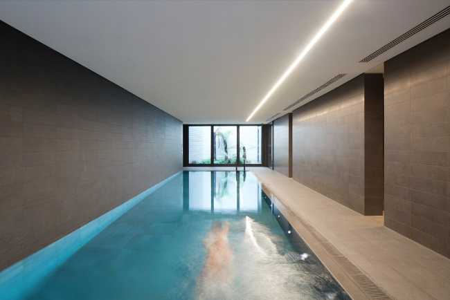 Indoor swimming pool to a building
