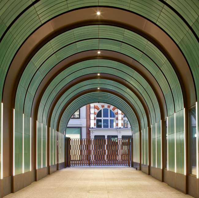 Entrance arch with green and brown colours