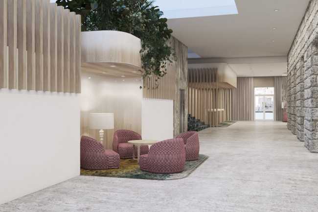 Interno hotel con poltrone colorate