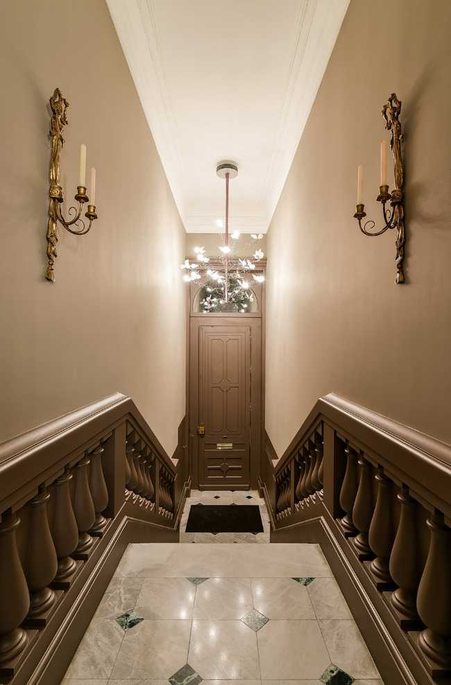 Historical staircase and chandelier