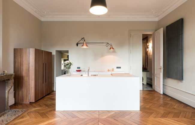 interiors with white kitchen and parquet