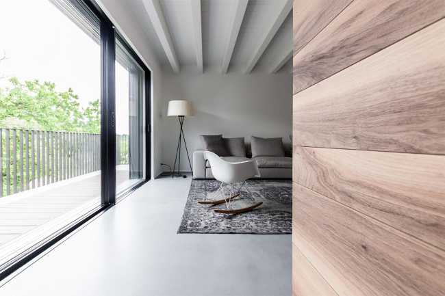 Lounge with window and balcony