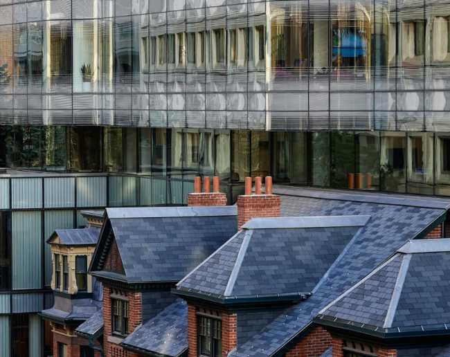 tetti spioventi e ampliamento in vetro