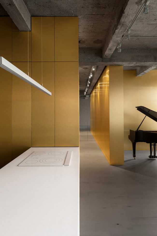 calcestruzzo ottone e pietra