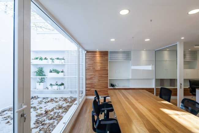 internal offices with white and wood glass