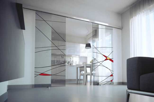 Porta scorrevole in vetro disegnato