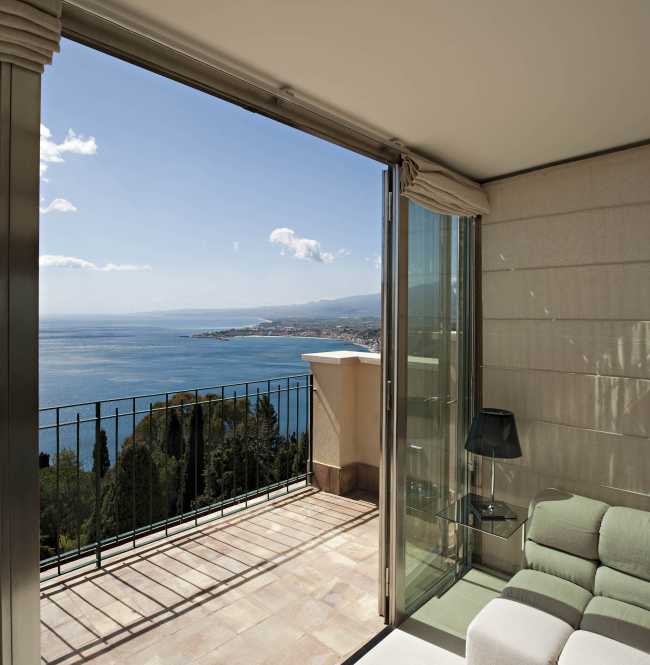 Stained glass window and living room on the sea
