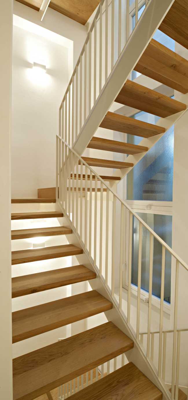 Internal staircase wooden and white apartments