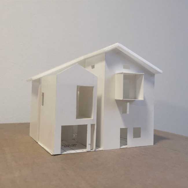 Modello ristrutturazione residenziale di due edifici con copertura unica