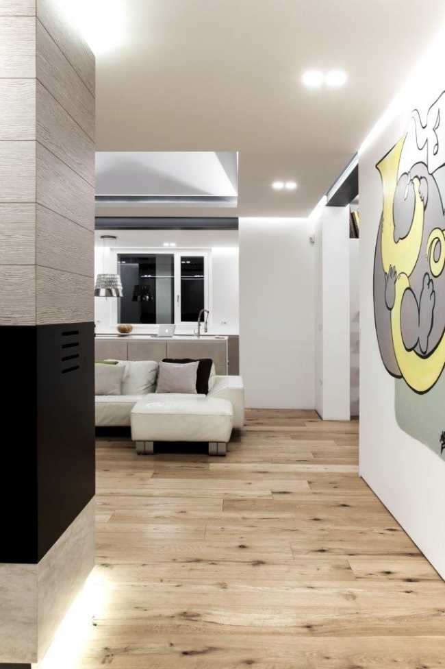 Salotto casa di campagna con parete disegnata