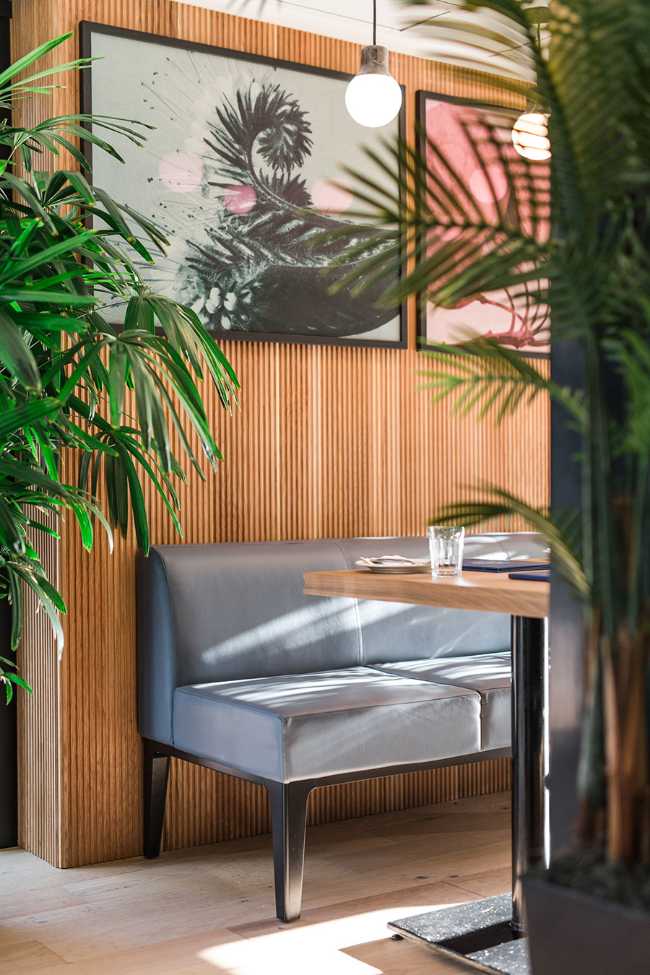 concept store restaurant finishes metal and wood upholstered sofas