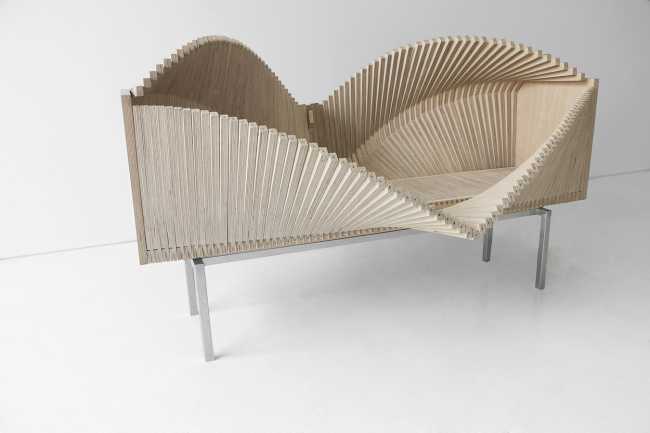 wave cabient in legno chiaro apertura ad onda