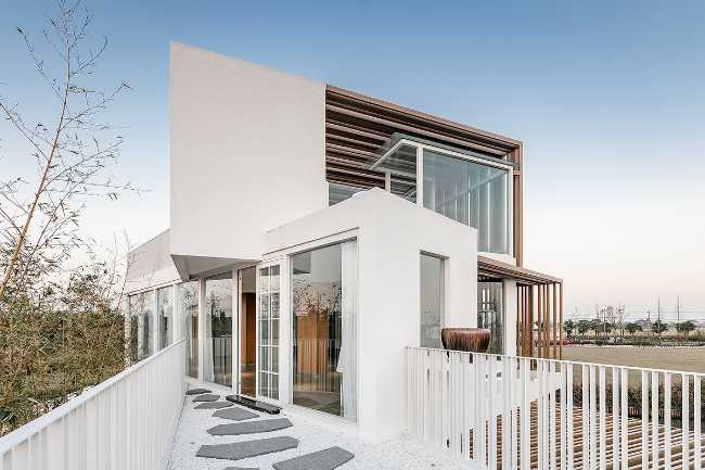 stacked white and wooden exterior containers