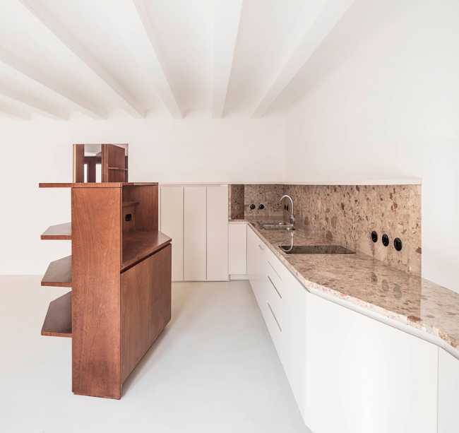 White neutral space with wooden furniture