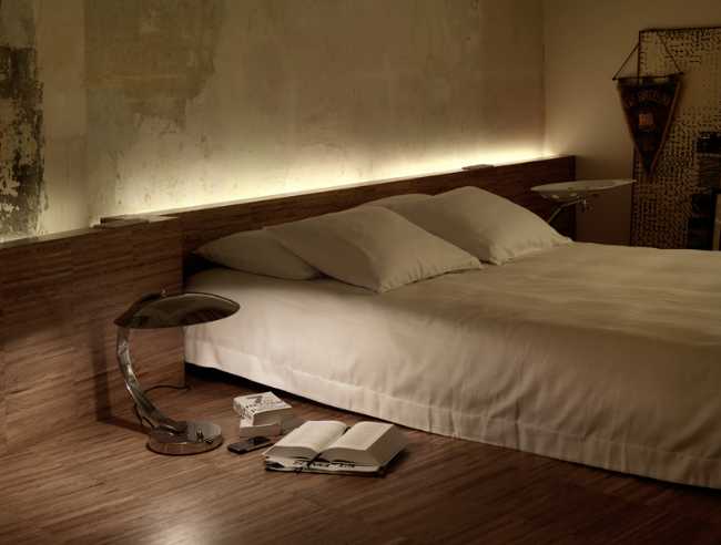 dormitorio e iluminación de pared