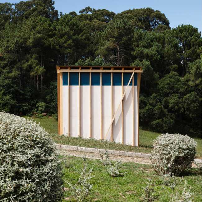 Wooden pavilion on a slope