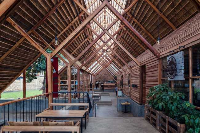 Restaurant with wooden structure and straw roof