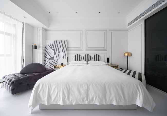 hotel cina ingresso minimal finiture bianco nero camera da letto