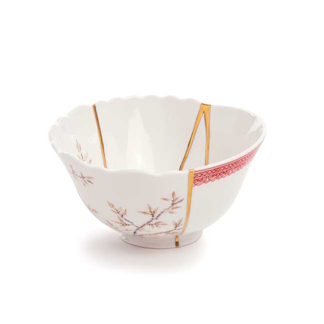 Kintsugi cup decorated with gold inserts