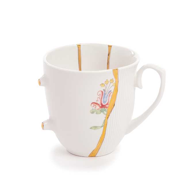 the Kintsugi cup decorated with gold inserts