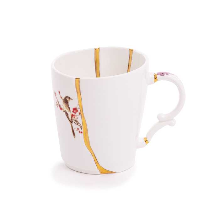 the Kintsugi cup decorated with gold inserts