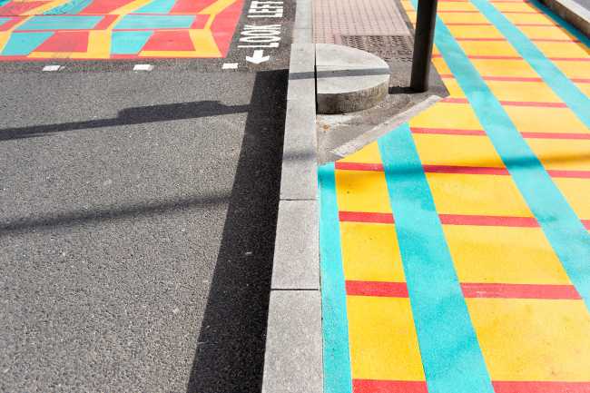 London graphic street art pedestrian crossing and bike path