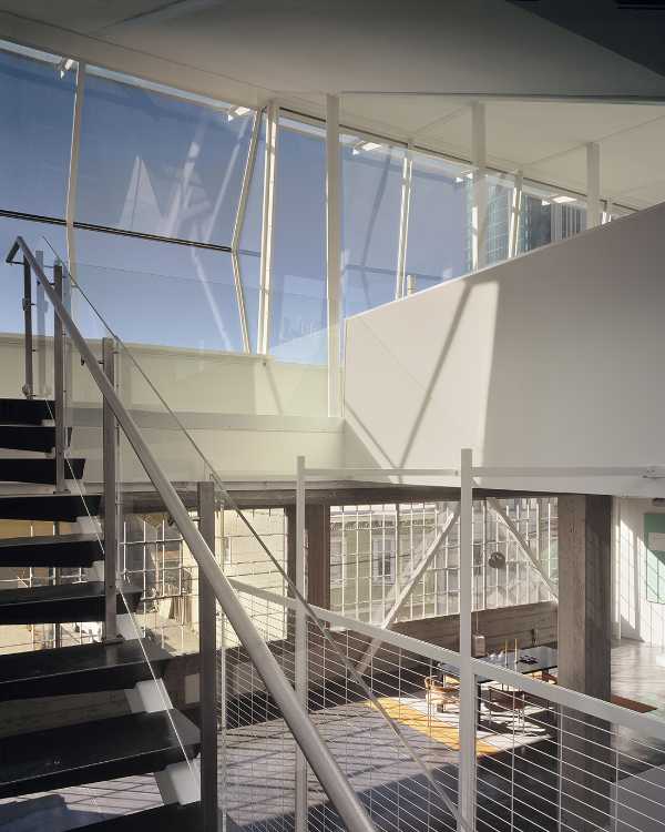 double volume metal stairs glass walls