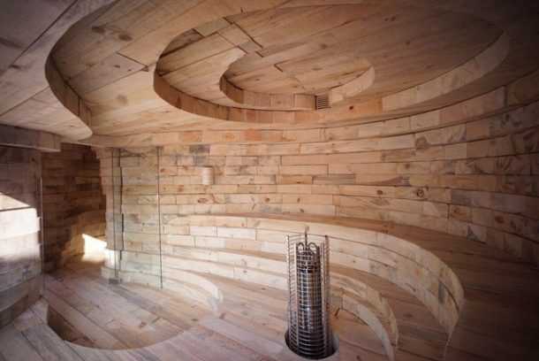 Internal wooden sauna with curvilinear shapes