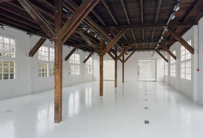 White interior and wooden ceiling