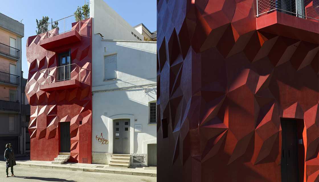 red geometric facade