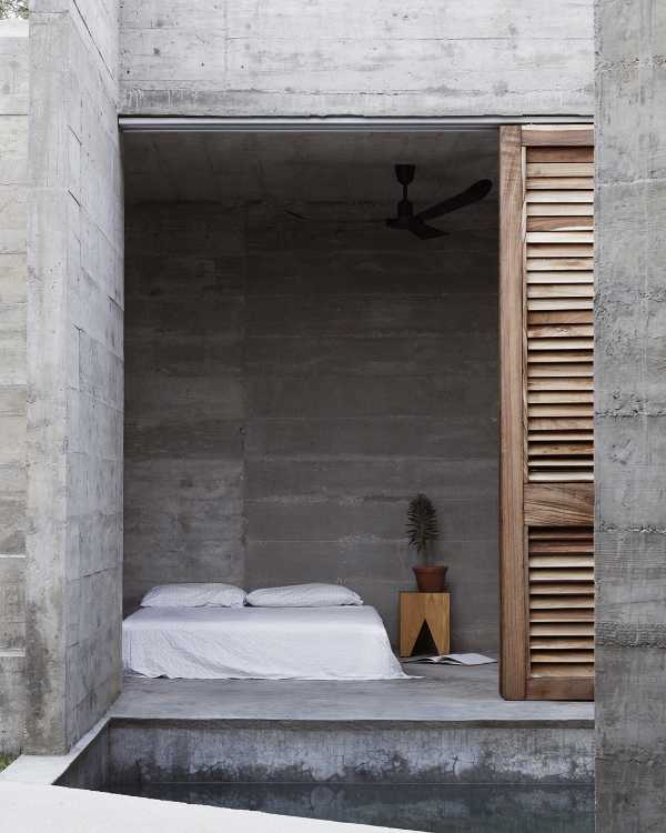 brutalist cement holiday home wooden openings