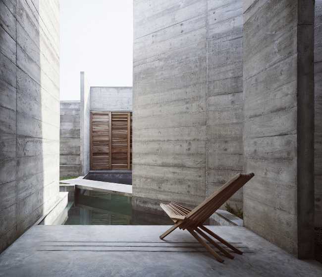 Brutalist concrete patio holiday home